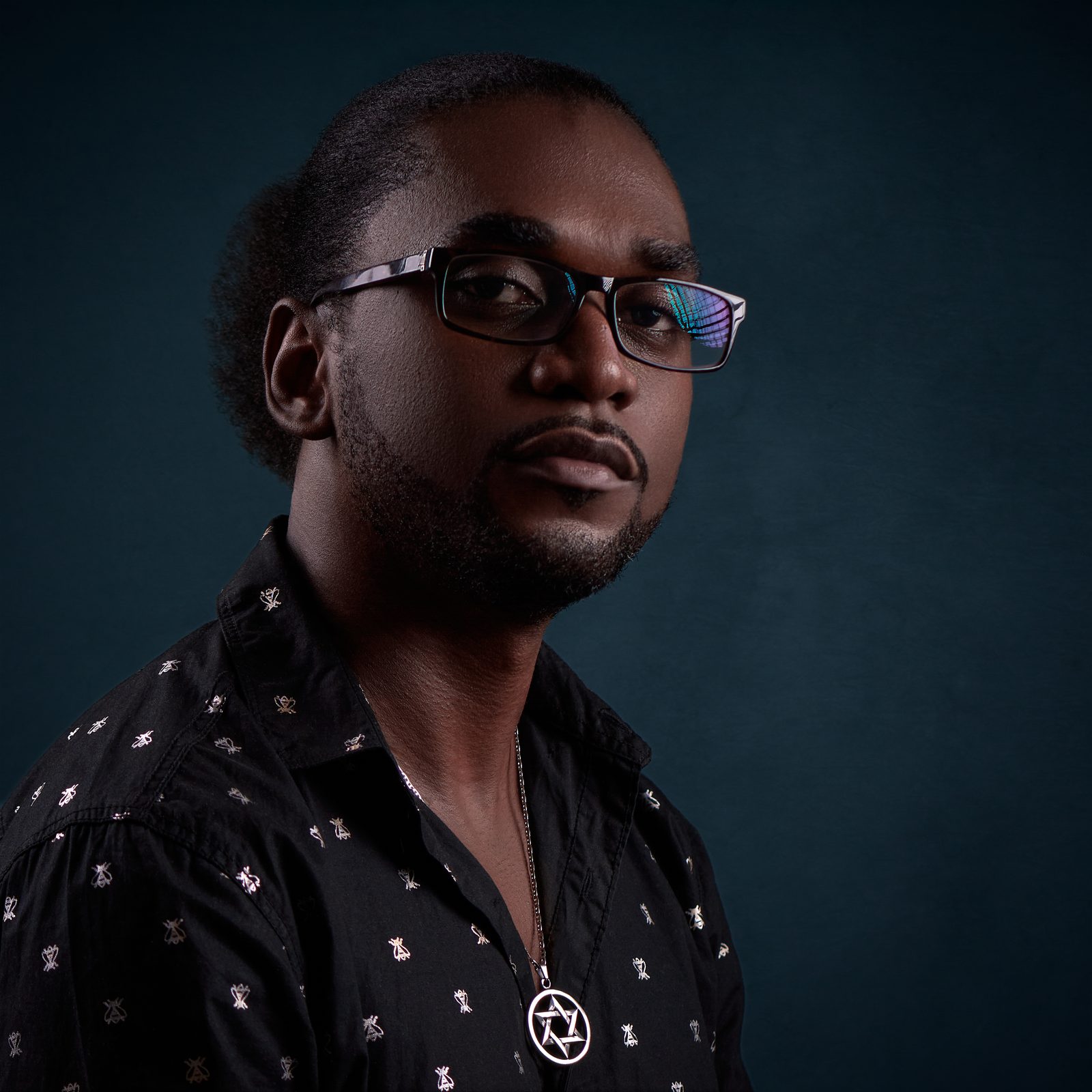 Portrait of Clark, photographer and creative director behind Clark Studios